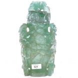 A large Chinese green fluorite jar and cover, relief carved and pierced bird and floral