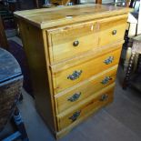 A modern pine chest of 4 long drawers, W78cm, H100cm, D43cm