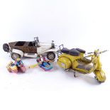 A reproduction painted metal Vintage car, length 37cm, 2 similar scooters, and 2 clockwork
