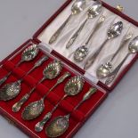 A cased set of 6 silver teaspoons with shell bowls, and a set of 6 Falstaff plated coffee spoons