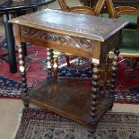 A 1920s oak side table with single drawer, acanthus leaf carved decoration, on bobbin turned legs,