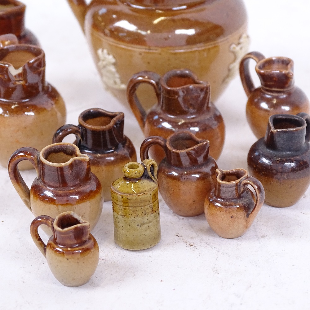 A group of miniature stoneware jugs and ginger beer bottles, including some Royal Doulton (15) - Image 2 of 2