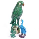 A Chinese green glaze pottery parrot, a turquoise glaze duck, and another, largest height 22cm (3)