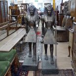 A pair of bronzed effect Egyptian guardian figures, height 120cm