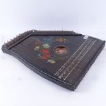 A German table zither with floral decoration, length 51cm