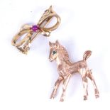 A 9ct gold horse design brooch, 5.6g, and an unmarked Egyptian gold bow design brooch, set with a