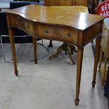 A reproduction cross-banded mahogany serpentine-front serving table, 2 frieze drawers, square