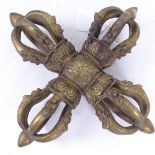 A large Tibetan cast-brass double vajra, length 24cm