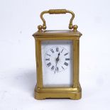 A 19th century miniature brass-cased carriage clock timepiece, white enamel dial with Roman