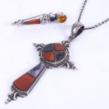 A 19th century unmarked Scottish silver Celtic design cross pendant set with hardstones, with a
