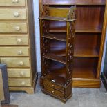 A narrow hardwood open bookcase with 2 short drawers, W27cm, H105cm, D16cm