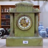 A large early 20th century green onyx 8-day architectural mantel clock, cream enamel dial with
