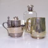 An Edwardian silver plated smoker's companion, a hip flask with silver cup and mount, and a