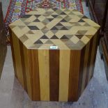 A handmade hexagonal coffee table, made from triangular section solid specimen woods, W55cm, H40cm