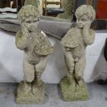 A pair of weathered concrete garden statues, H70cm
