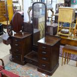 A 1930s walnut drop-centre dressing table with fitted drawers, W130cm, H175cm, D50cm