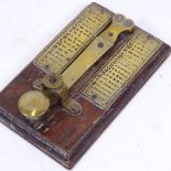 A 20th century morse code key, brass fittings with guide plaques and mahogany base, base length 14cm