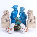 A group of Oriental glazed pottery Dogs of Fo, largest height 15cm (7)