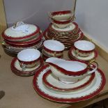 A Royal Albert dinner service, gilded red and cream design, including dinner plates, soup bowls,