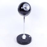 A 1960s design articulate eyeball lamp, on ball and socket base, height 41.5cm