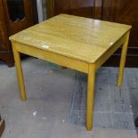 An Ercol light elm and beech square coffee table, on turned legs, W64cm, H54cm