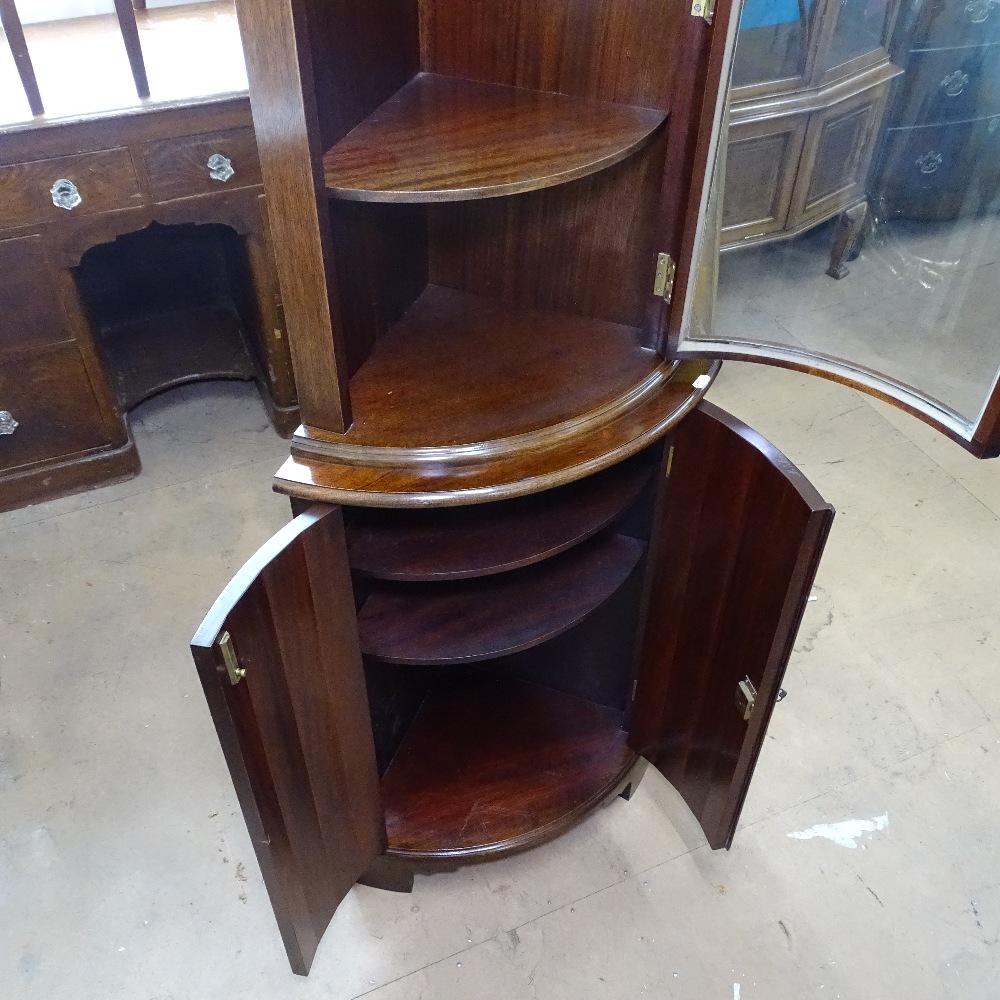 A mahogany corner cabinet with glazed bow-front door and cupboards under, on bracket feet, W57cm, - Image 2 of 2