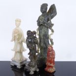 A group of Chinese hardstone carvings, depicting Guanyin and sages, largest height 30cm (4)