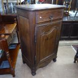 A Continental Antique oak side cabinet, with single drawer and panelled cupboard under, scrolled