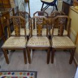 A set of 6 1930s dining chairs, with carved backs and cane seats