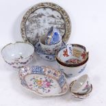 A group of Chinese tea bowls and saucer, including 18th century Clobbered Ware example, mostly A/
