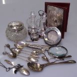 A silver-topped powder bowl, silver teaspoons, a silver magnifying glass, a plated cruet set etc