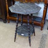 A chip carved 2-tier occasional table of octagonal form, W46cm, H63cm