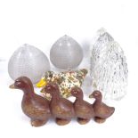 A set of 3 moulded glass light shades, 18.5cm, a pair of glass light shades, and 2 duck ornaments