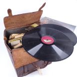 A metal-lined leather bag containing a quantity of 78rpm records, various genre