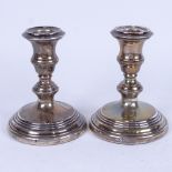 A pair of squat silver candlesticks, Birmingham 1965, height 11cm