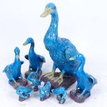 A group of Chinese turquoise glaze duck figures, largest height 23cm, largest 4 A/F (8)