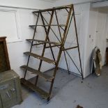 A large Vintage cast-iron 6-tier plant stand, on fold-out A-frame, W105cm, H190cm, W140cm