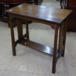 A stylised Arts and Crafts oak hall table, with pierced sides, on square tapered legs, W72cm, H73cm,