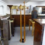 A contemporary designer coat stand in cherrywood and chrome