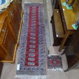 A red ground Afghan design runner, and a small mat, 120cm x 56cm