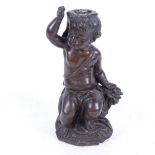 A bronze figure of a cherub, 28cm