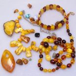 A tray of Baltic amber necklaces, bracelet, brooch etc