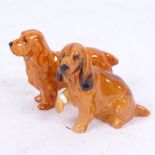 A Royal Worcester Cocker Spaniel dog, model no. 2944, and a Royal Doulton Spaniel, height 6cm (2)