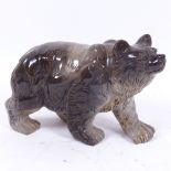 A large grey soapstone grizzly bear figure, length 21cm