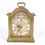 A Swiza cast-brass dome-top 8-day mantel clock, gilt face with silvered chapter ring and 15 jewel