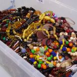 A large quantity of mixed costume jewellery, bead necklaces, sequins etc