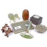 Various Oriental carved hardstone items, including orange hardstone seal, jade roller, jadeite