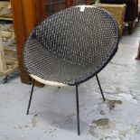 A mid-century plastic-coated garden chair on black and wrought-iron legs