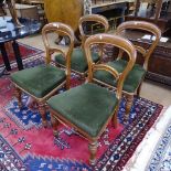 A set of 4 Victorian mahogany balloon-back dining chairs