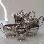 An electro-plated Britannia Metal 4-piece tea and coffee set of half-fluted form, with scrolled
